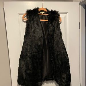 Black faux fur vest